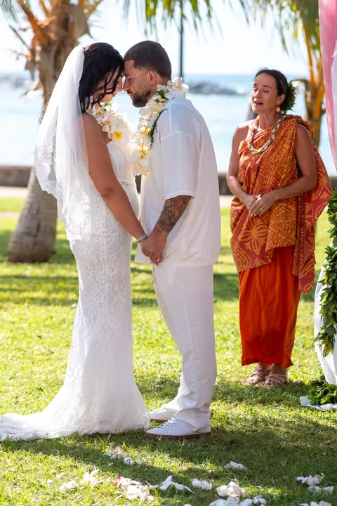 The officiant guiding the couple