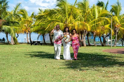 The processional on the grass under the palm trees