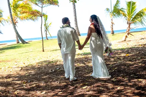 Walking hand in hand on the grass