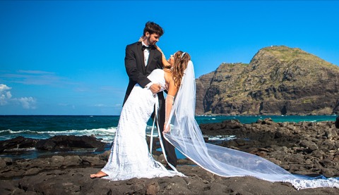 Ryan dips Stephanie on the lava rocks at Makapuu beach