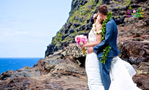 A kiss in the ocean mist on the cliffs of Makapuu