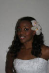 A bridesmaid getting ready at the hotel, smiling