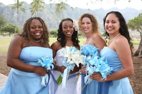 Damarus with his groomsmen in royal blue, side by side