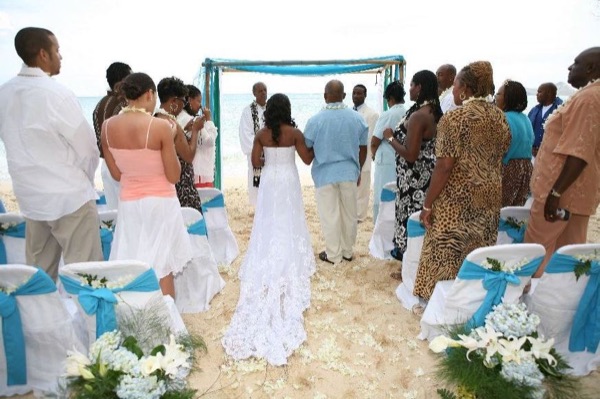 The bridal party at the ceremony, smiling