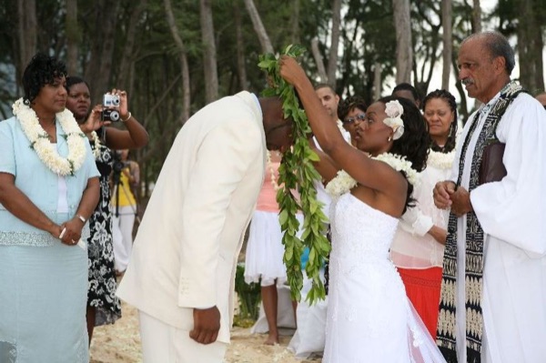 The bridal party at the ceremony, laughing together