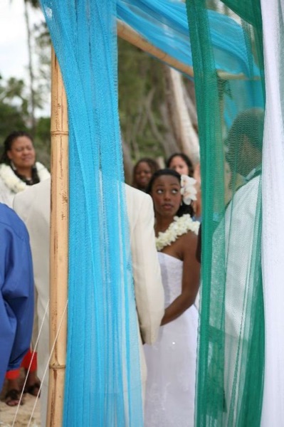 Naheshae and Damarus during the ceremony, laughing together