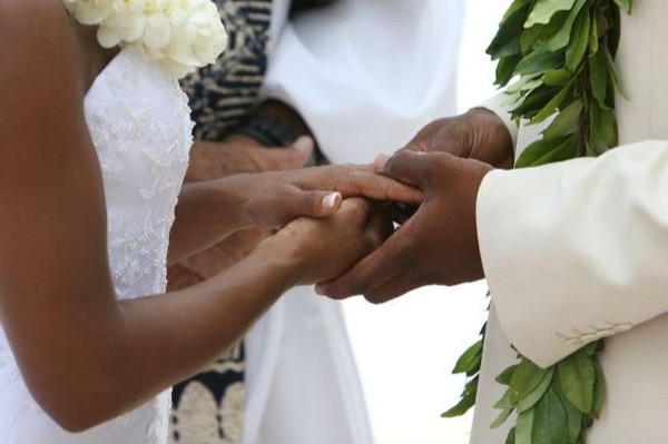The bridal party at the ceremony, in a happy moment