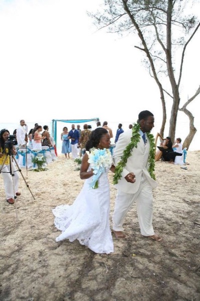 The bridal party at the ceremony, looking at each other