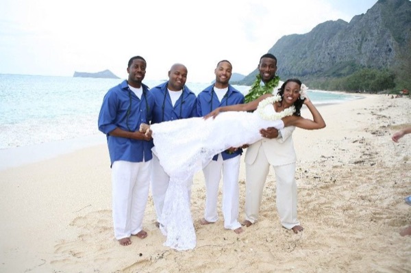 Naheshae with her bridesmaids in light blue, laughing together