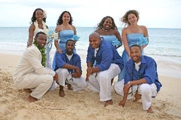 Naheshae with her bridesmaids in light blue, in the sunshine
