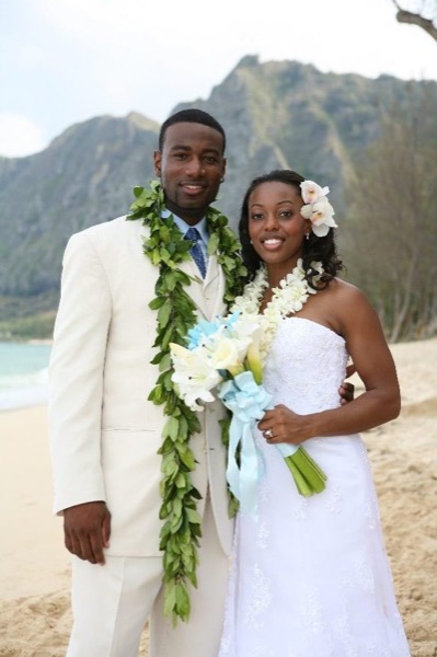 Naheshae and Damarus by the water, smiling