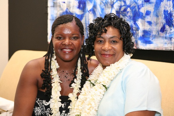 Naheshae and Damarus at their reception, under a blue sky