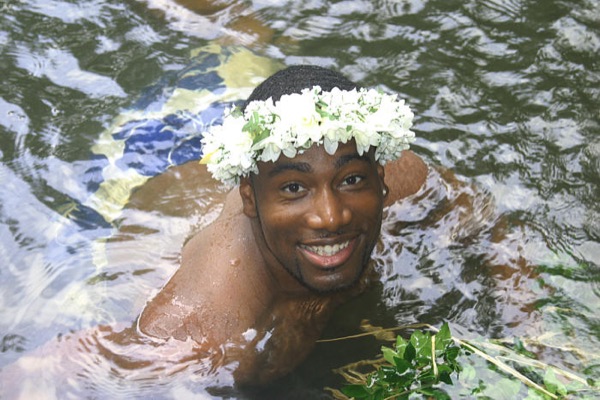 Damarus smiling in a forest pool