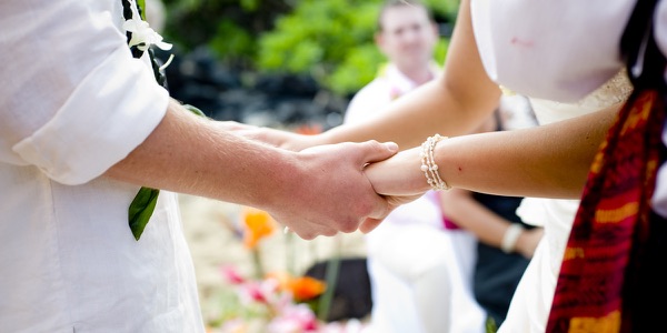 Natasha and Tyson during their ceremony by the sea