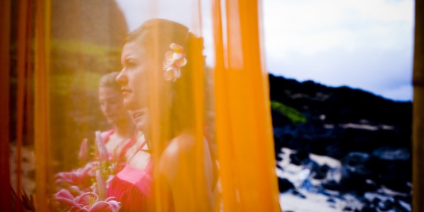 Family watching the ceremony by the lava rocks, one more moment