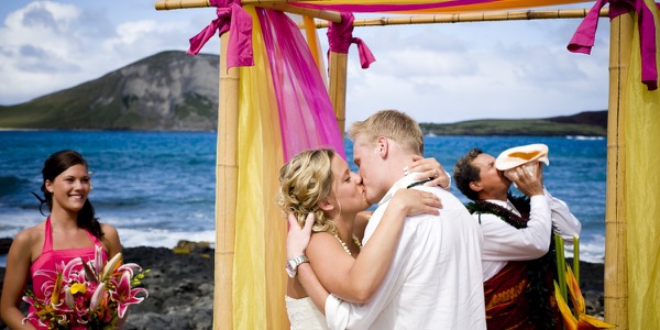 Family watching the ceremony by the lava rocks, more from the day