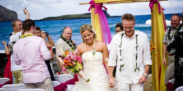 Natasha and Tyson during their ceremony by the sea, a moment later