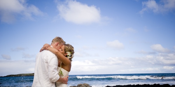 Natasha and Tyson celebrating by the sea
