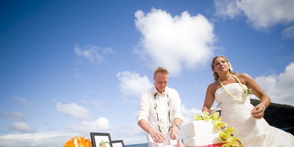 Natasha and Tyson with their bridal party on the rocks, one more moment