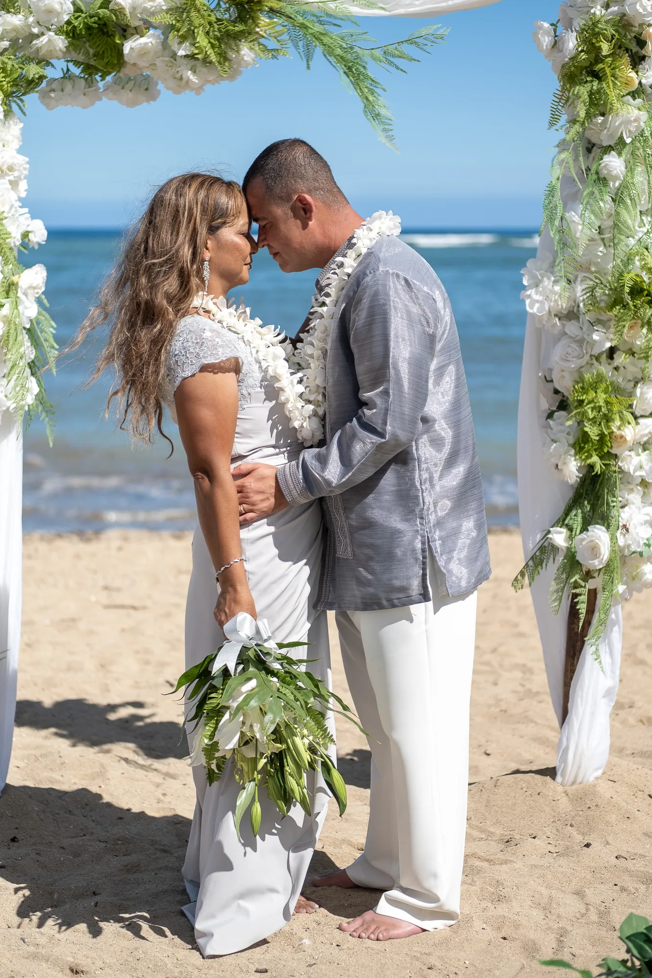 A kiss on the cheek at the arch