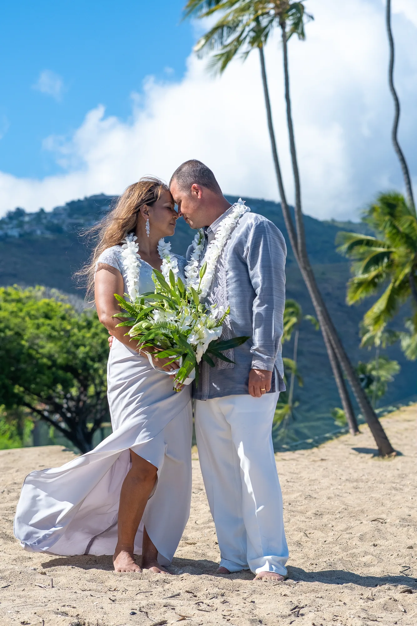 Leaning in under the palms