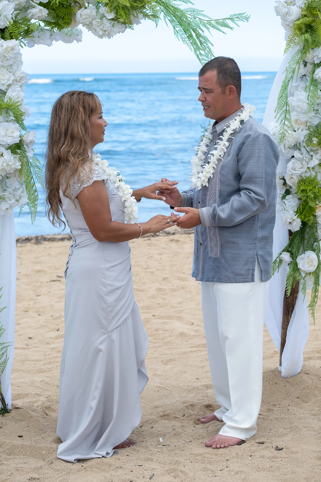 Slipping the ring onto her finger