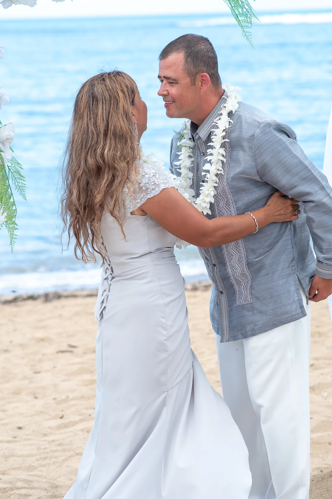 Rose reaching for Nate during the vows
