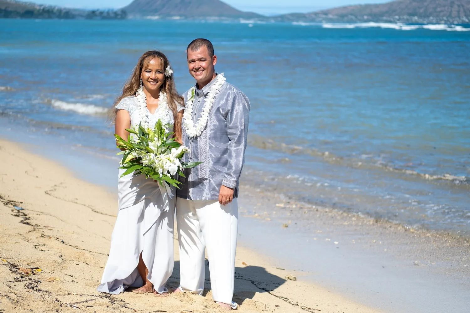 Smiling by the sea with the bouquet
