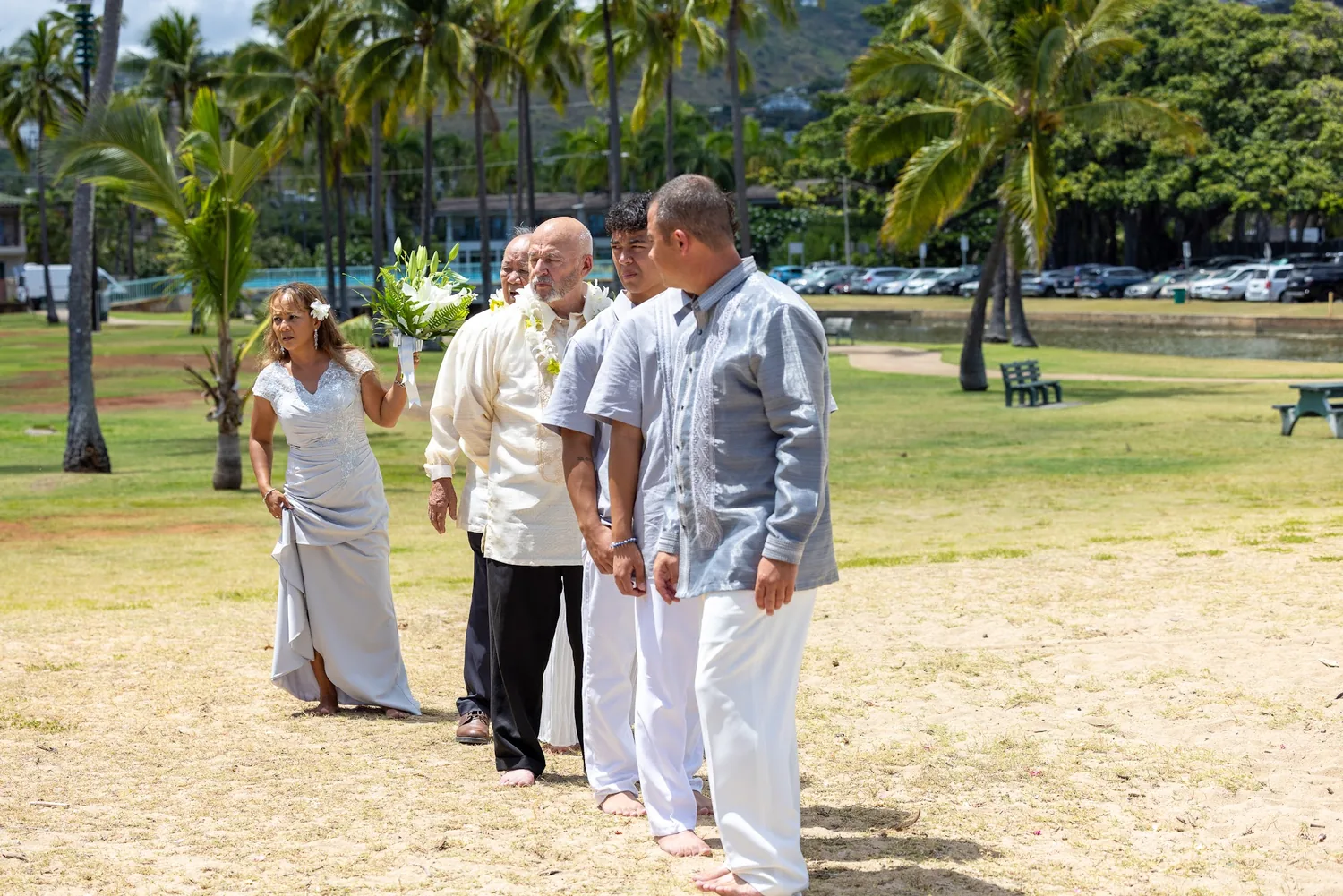 Walking under the palm trees to the beach
