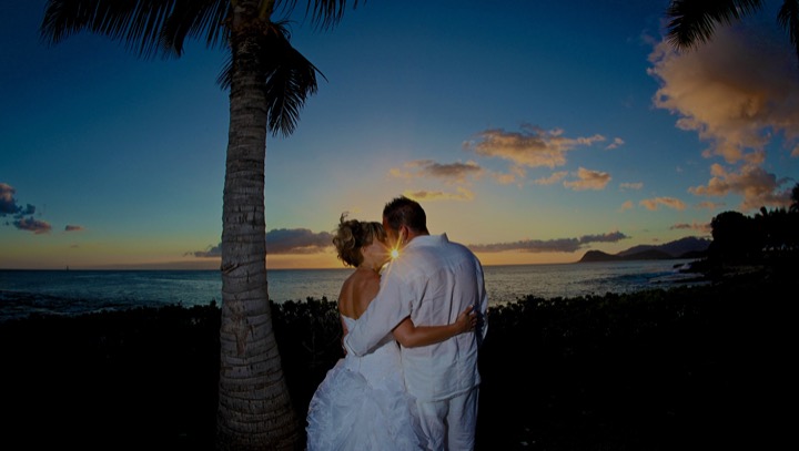 Becky and Eric at sunset at their beach estate house wedding