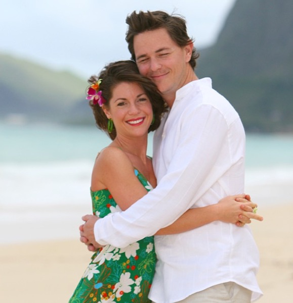 Friends and family with Teri and Dennis on the beach, in a happy moment