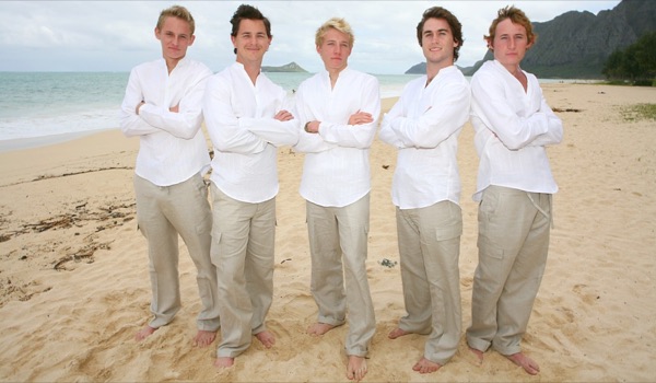 Teri and Dennis with their children on the beach, from another angle