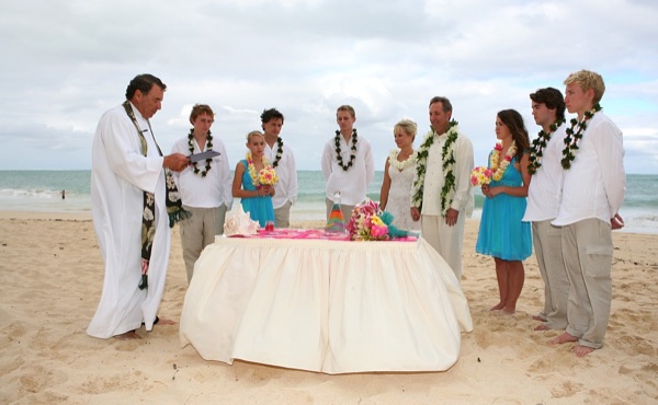 The sand blessing, smiling