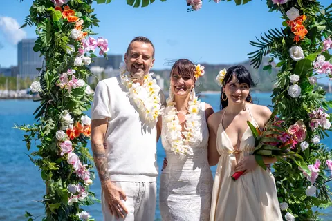 Three together at the flower arch
