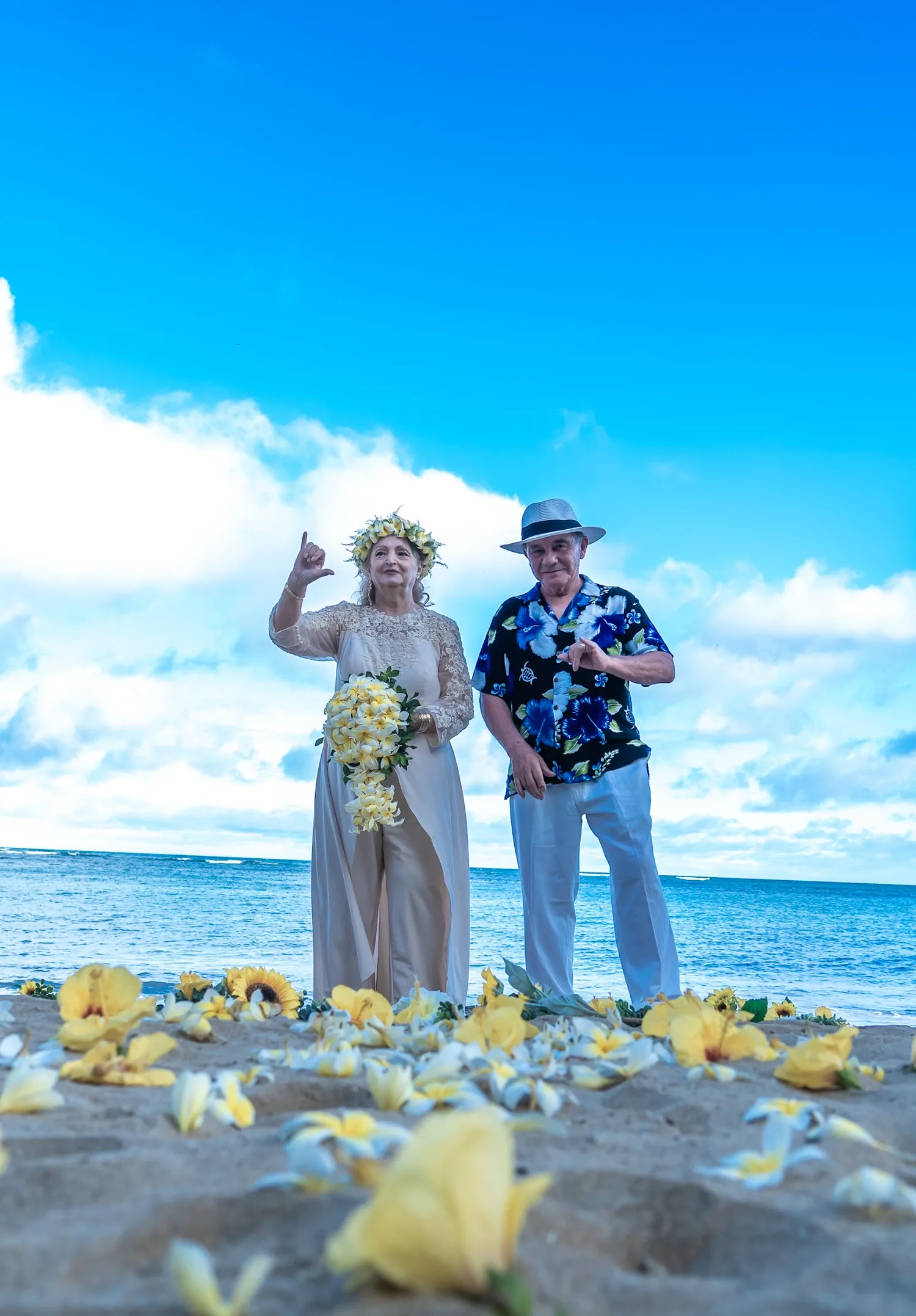 Daniel and Shirley facing each other by the ocean
