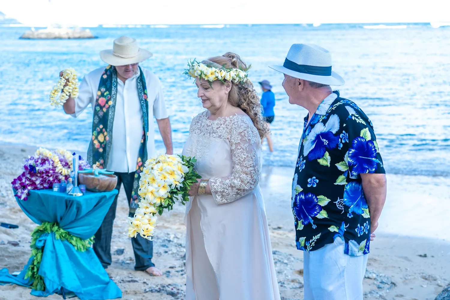 Our minister Paul greeting Daniel and Shirley on the sand