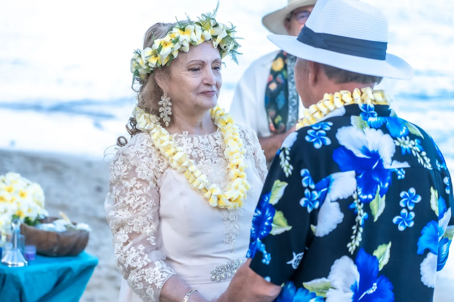 Shirley in her plumeria haku smiling at Daniel