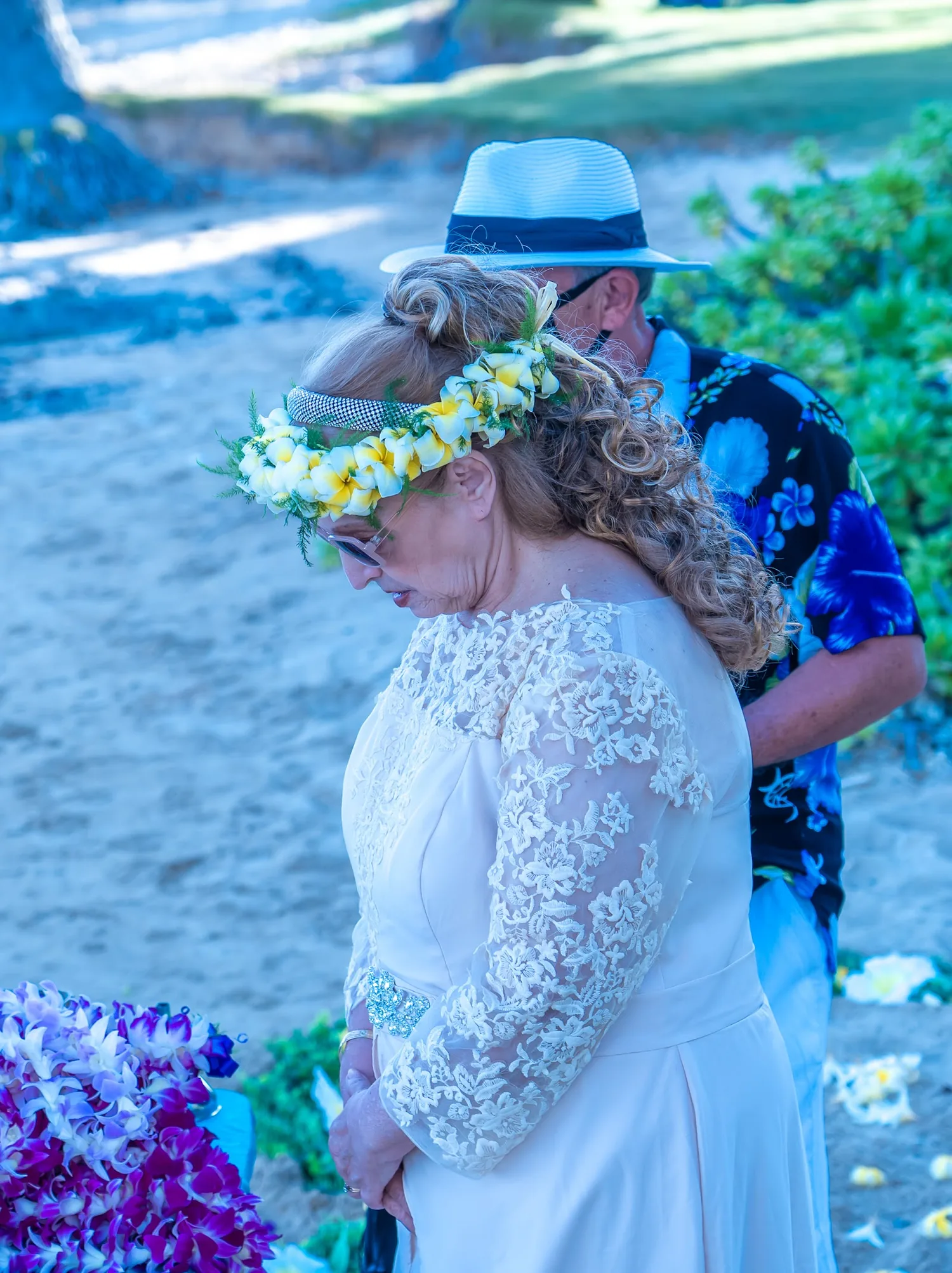 Shirley in her plumeria haku with Daniel