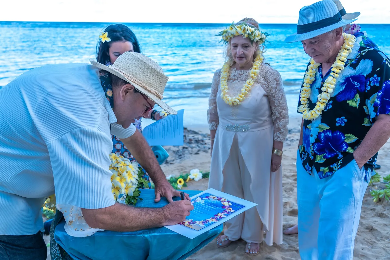 Signing the certificate with family watching