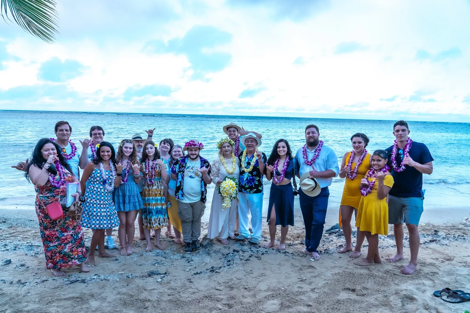 The whole group on the beach at Kahala