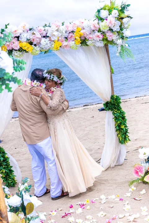 A hug after the lei exchange