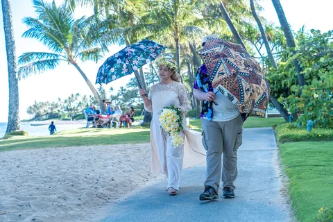 Daniel and Shirley strolling on the path under the trees
