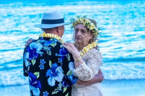 Daniel holding Shirley close by the ocean