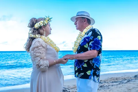 Facing each other by the turquoise water