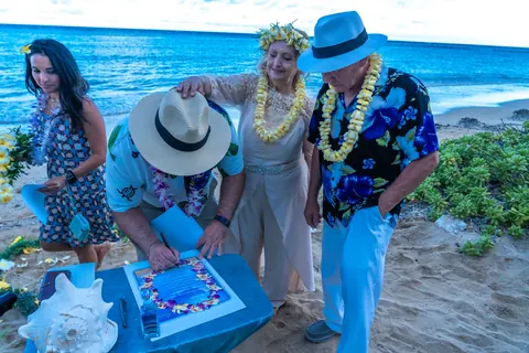 Family looking at the certificate