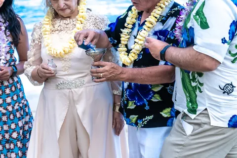 Placing a lei on Shirley