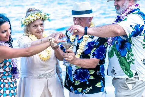 Placing leis on the family