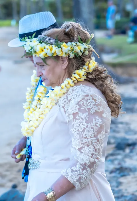 Shirley in her yellow plumeria lei and haku