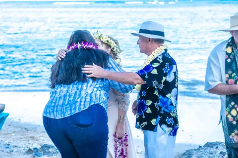 Shirley with family in leis