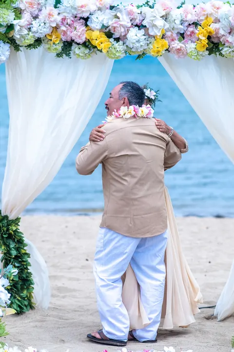A warm hug by the white curtain